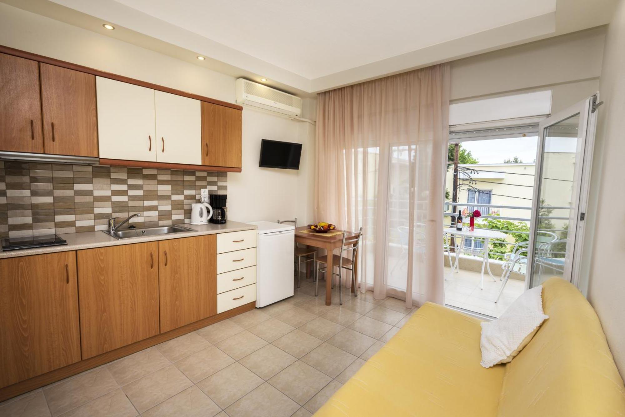 Apartments Eleni 4 Seasons Hanioti Rum bild
